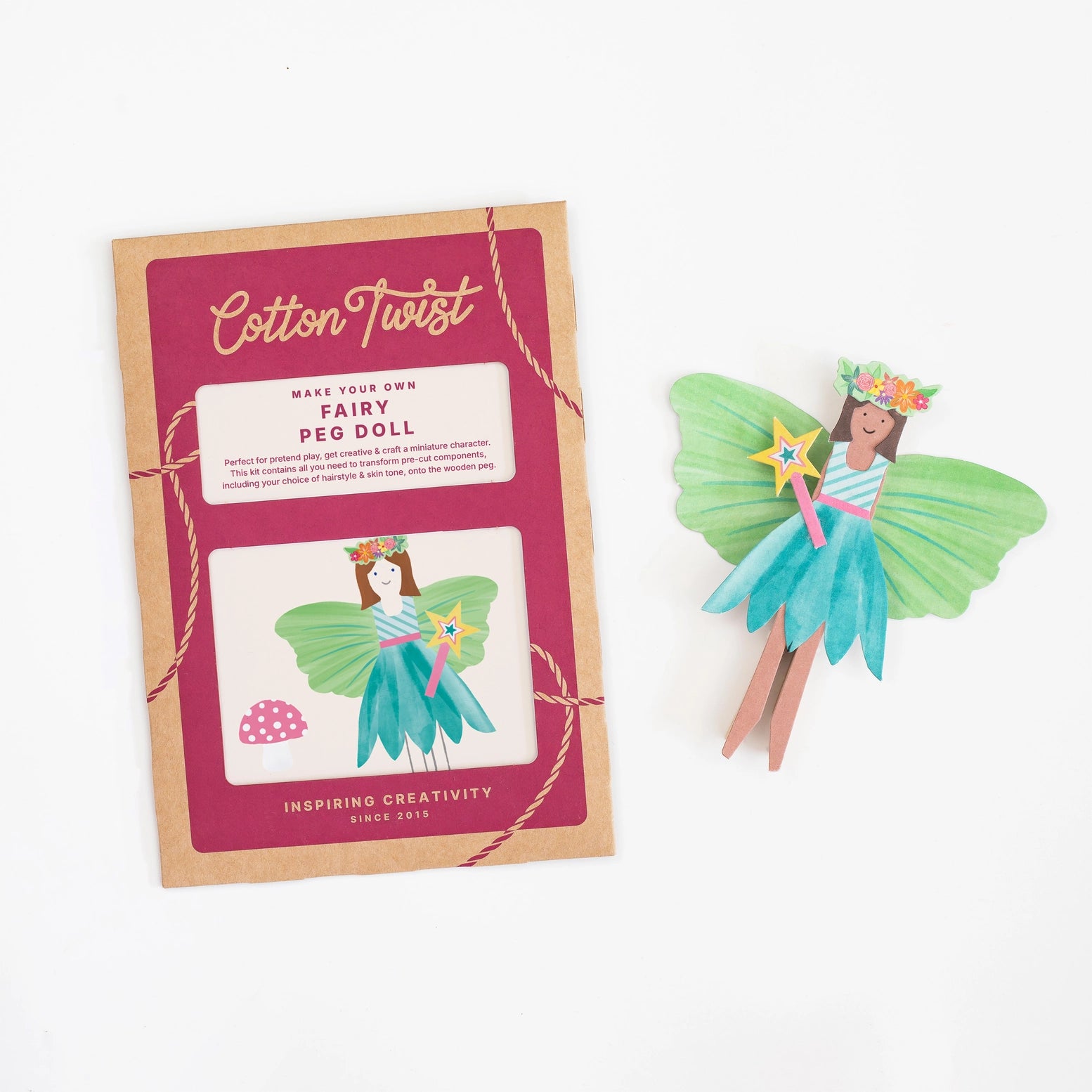 Fairy peg doll with packaging labeled 'Cotton Twist' on a white background