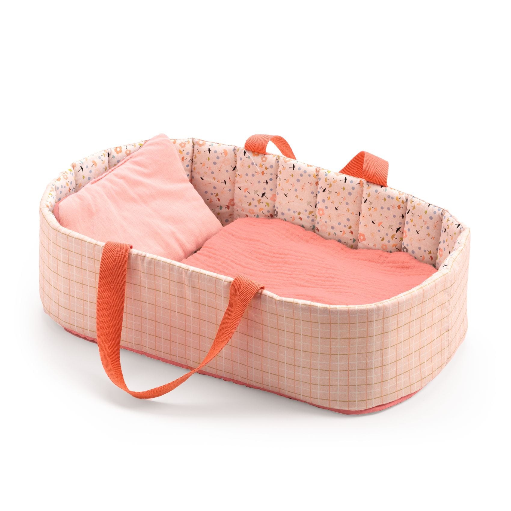 Baby dolls crib with pink and orange bedding on a white background