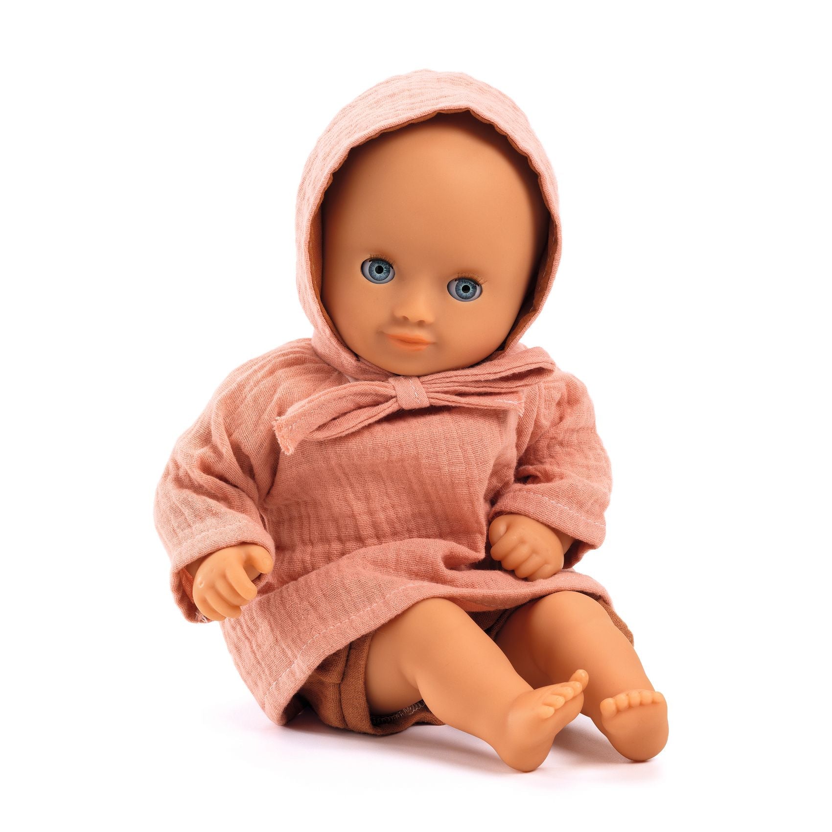 Doll wearing a pink hooded outfit on a white background