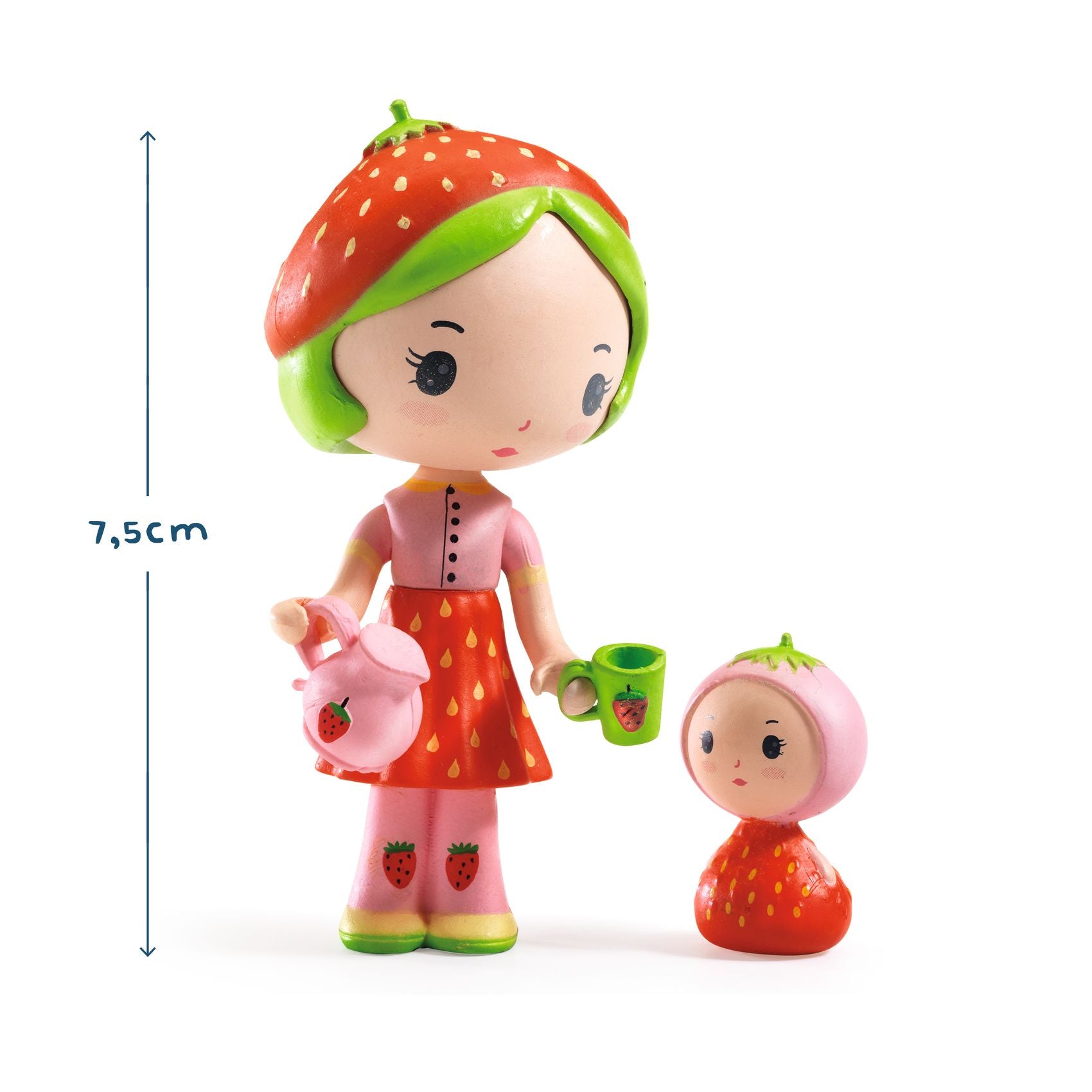 Toy figure of a girl with strawberry-themed outfit and accessories, standing next to a smaller figure.