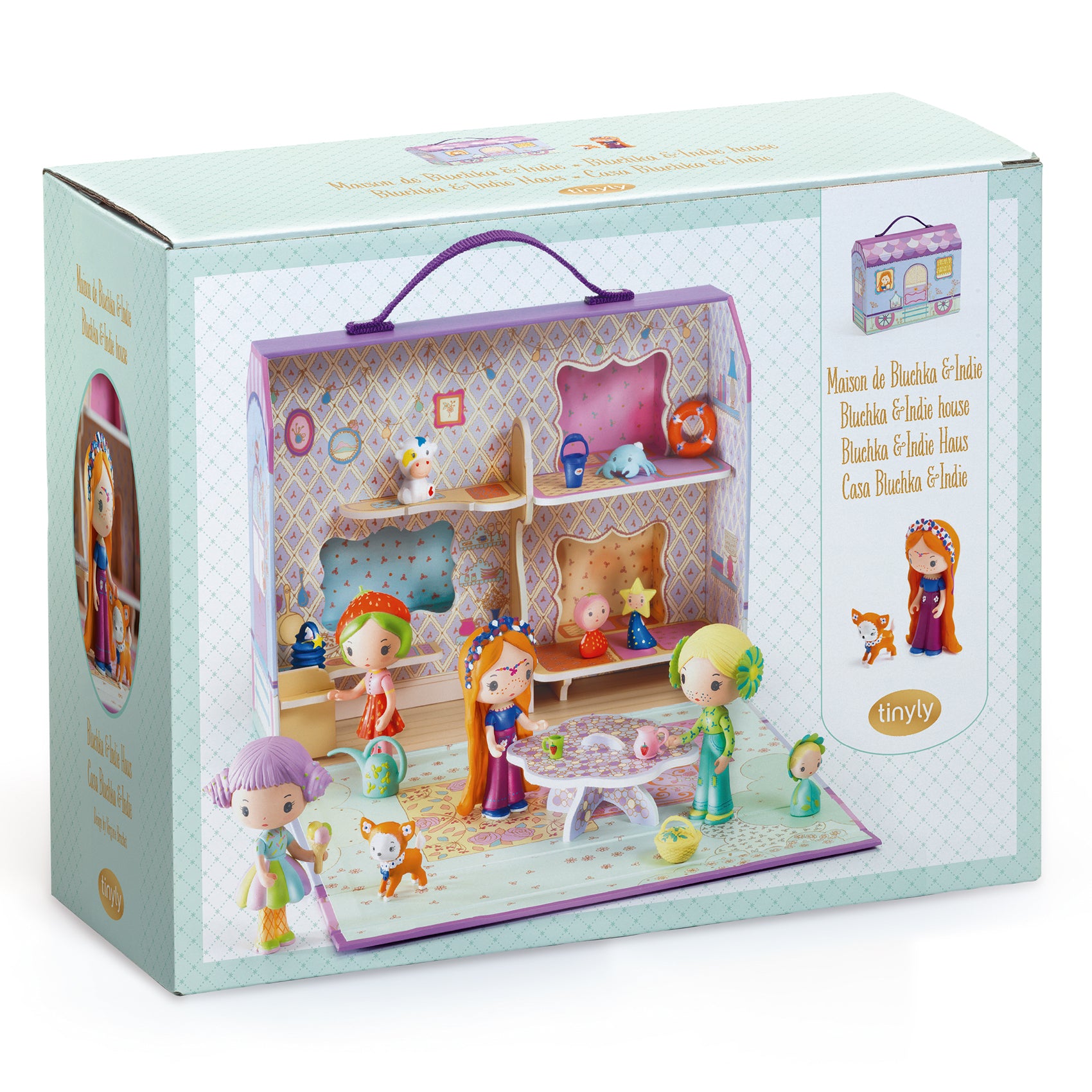 Toy dollhouse set in its packaging with figurines and furniture.