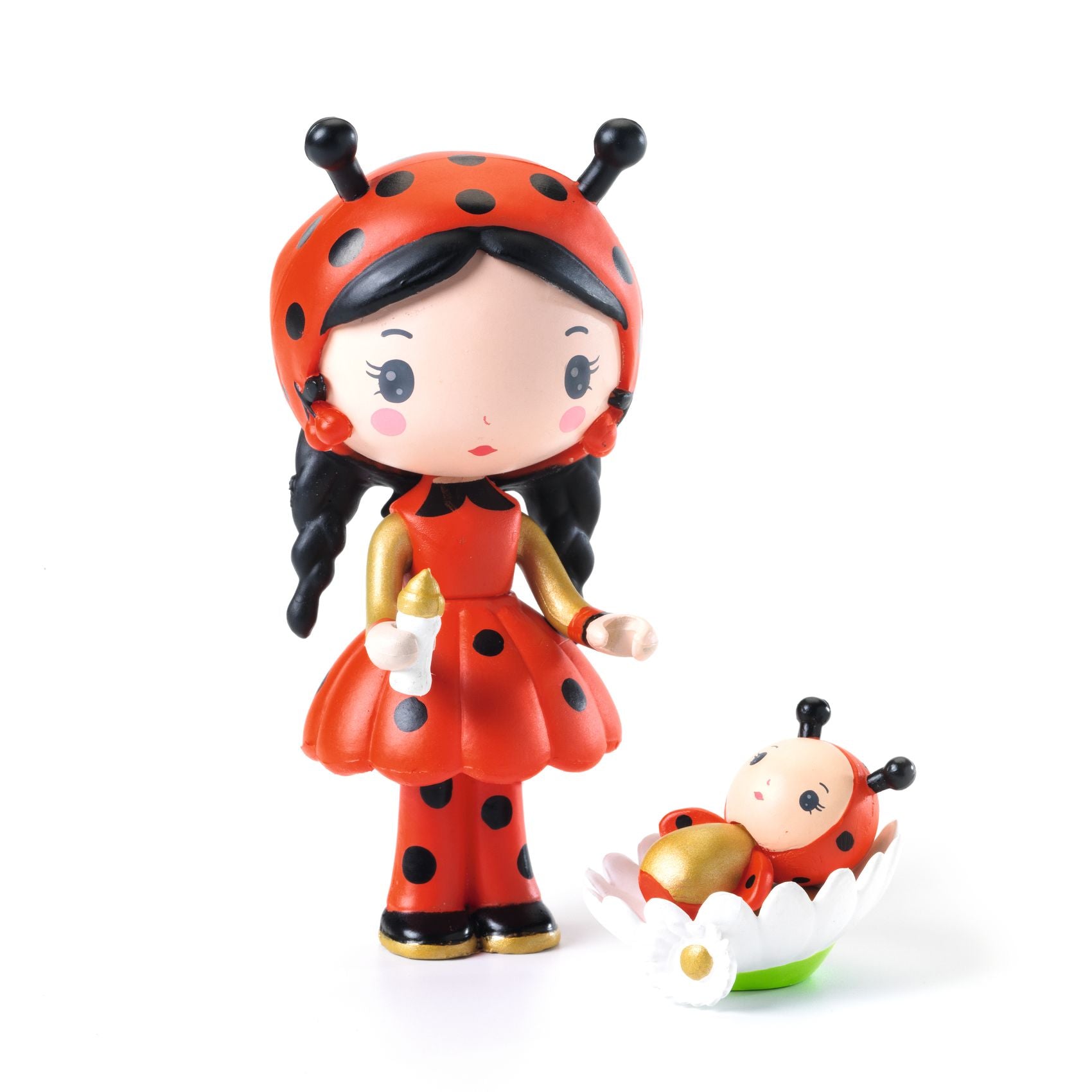 Toy figure of a ladybird girl with a smaller figure on a white background