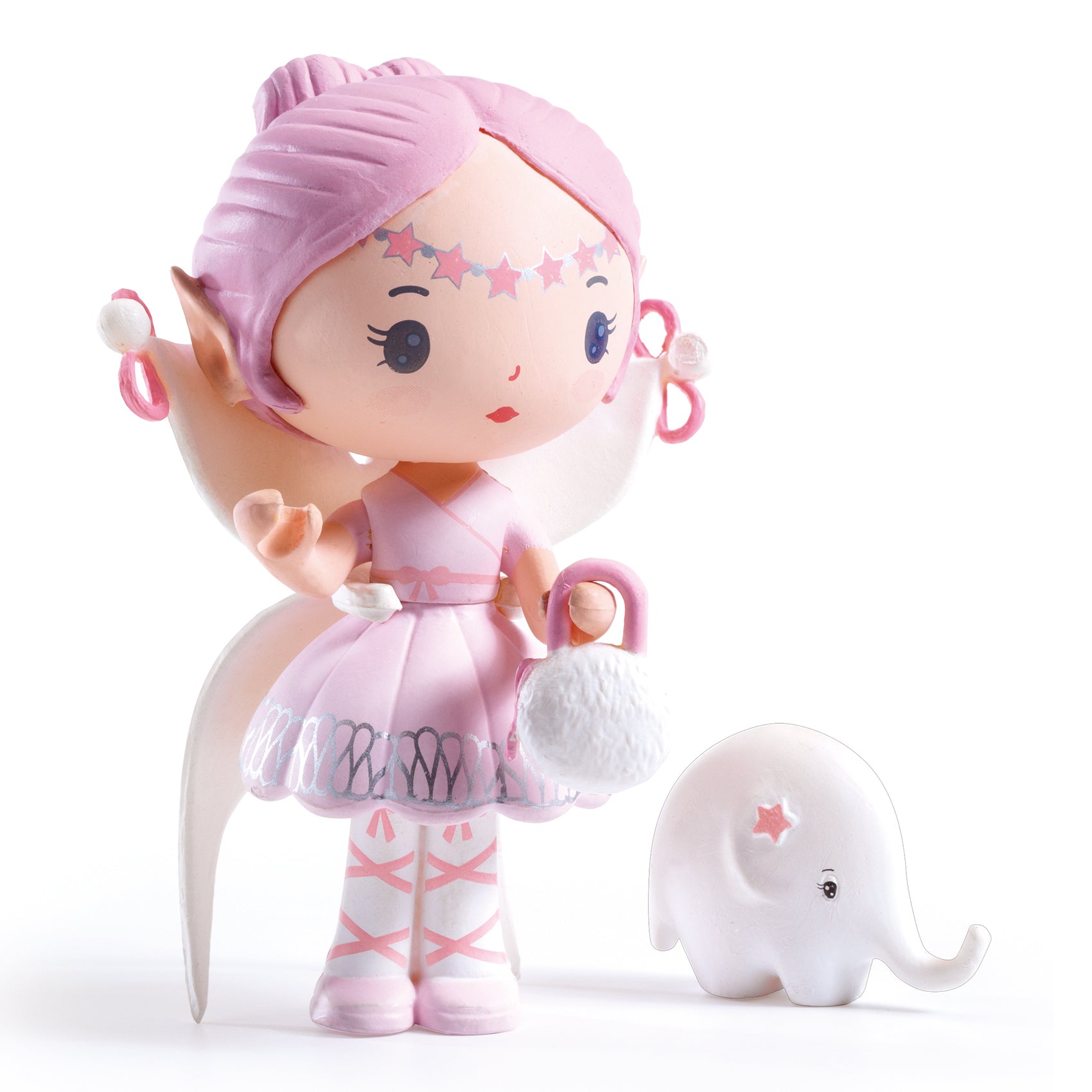 Toy figure of a girl in a pink outfit with a small elephant on a white background