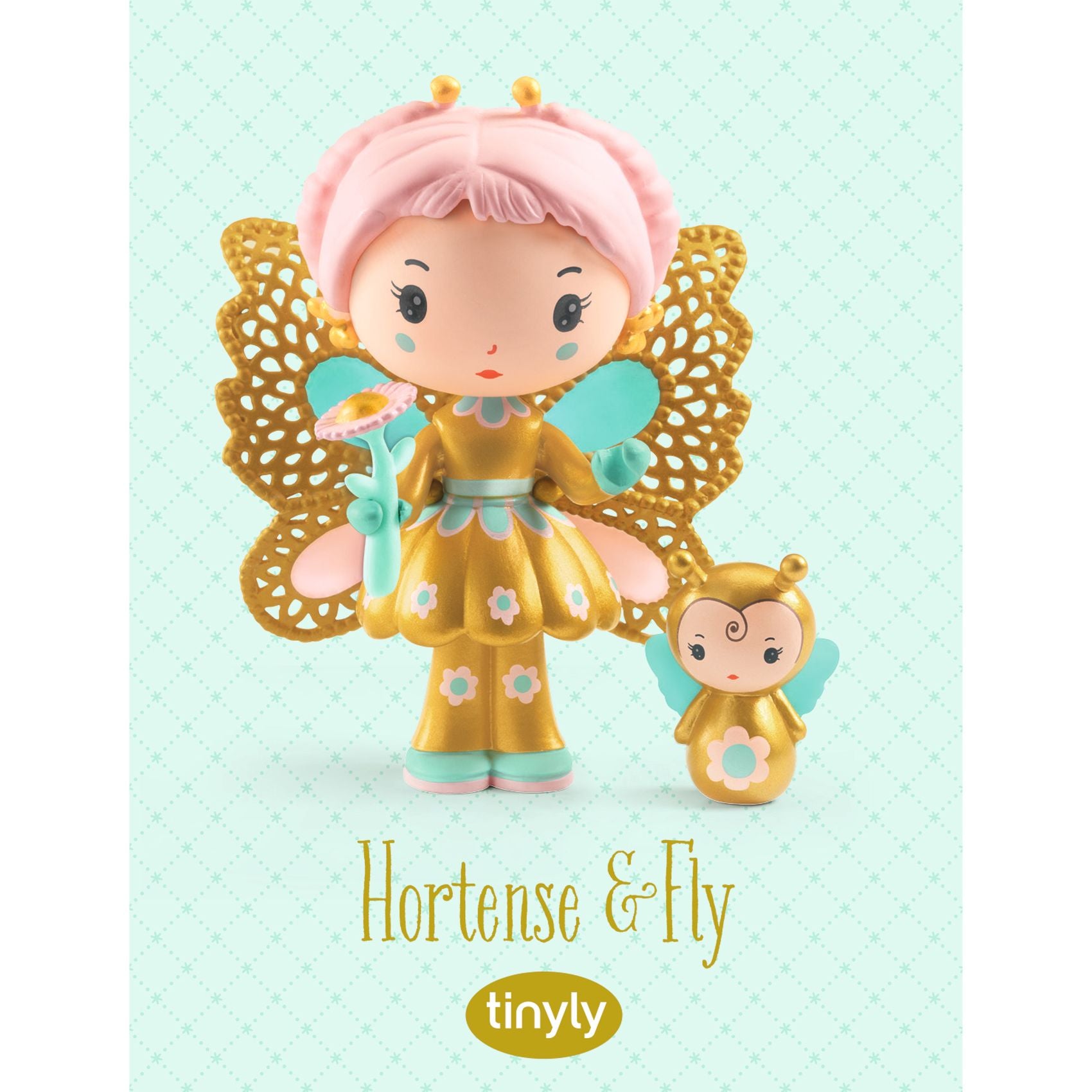 Two fairy figurines with pink hair and gold wings on a light blue background, featuring the brand 'tinyly'.