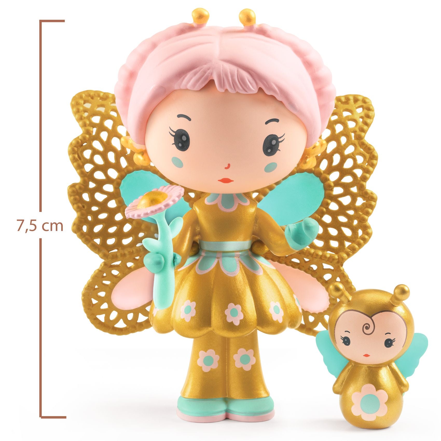 Toy figure of a fairy with gold dress and pink hair, holding a flower, with a smaller figure beside it on a white background.
