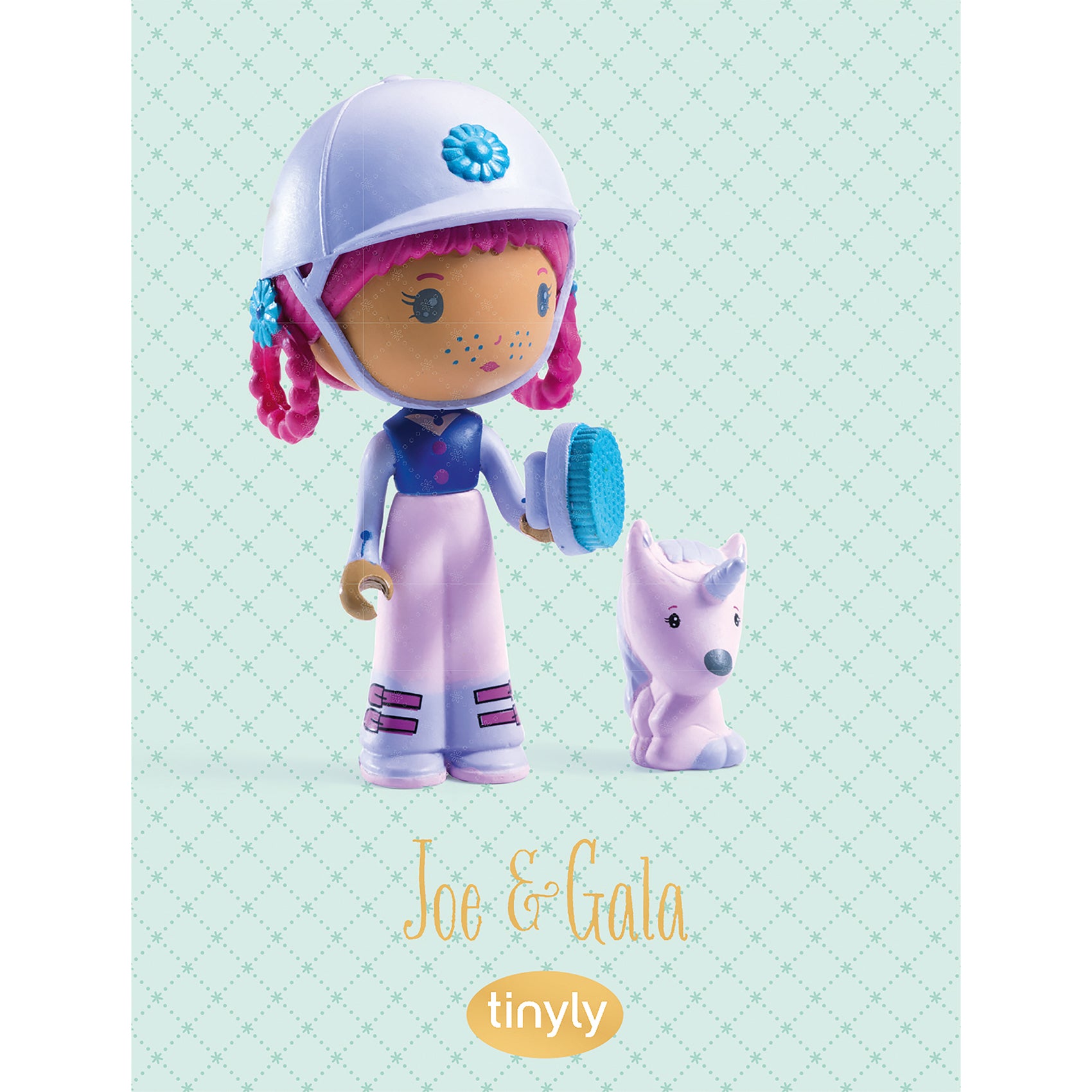 Toy figure with helmet and a small unicorn on a light blue background, featuring the brand 'tinyly'.