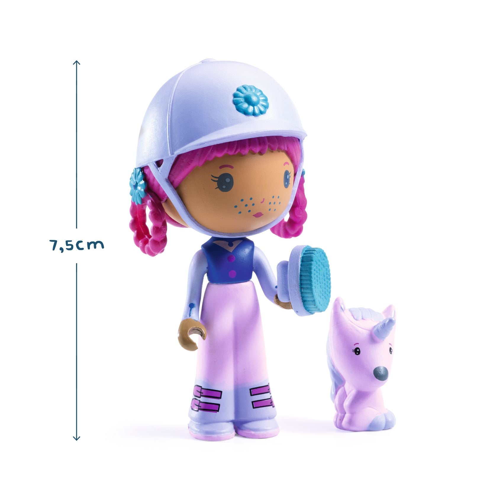 Toy figure with pink hair and helmet next to a small unicorn-like creature on a white background