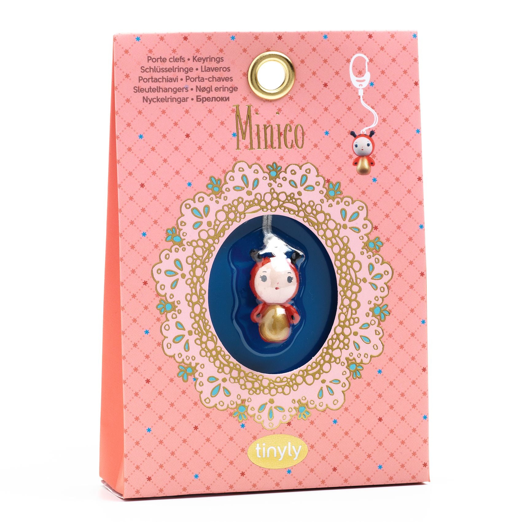 Pink packaging of a Minico product with a small character on a white background