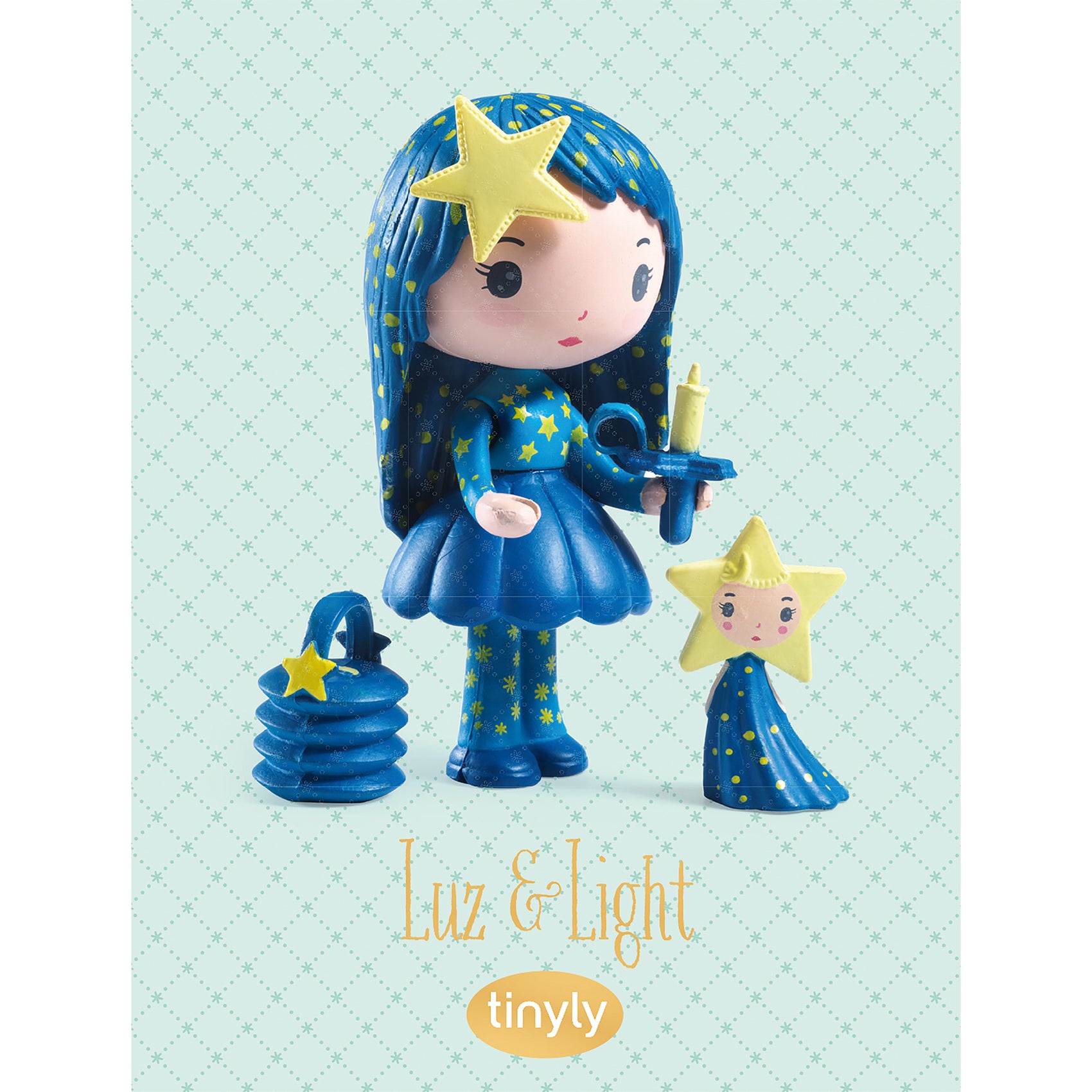 Toy figure of a girl with blue hair and star accessories on a light blue background, featuring the brand 'tinyly'.