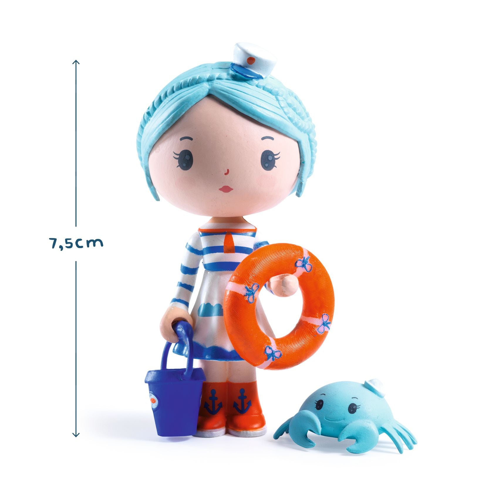 Toy figure with blue hair, striped shirt, and orange life buoy holding a blue bucket and with small blue crab on a white background.