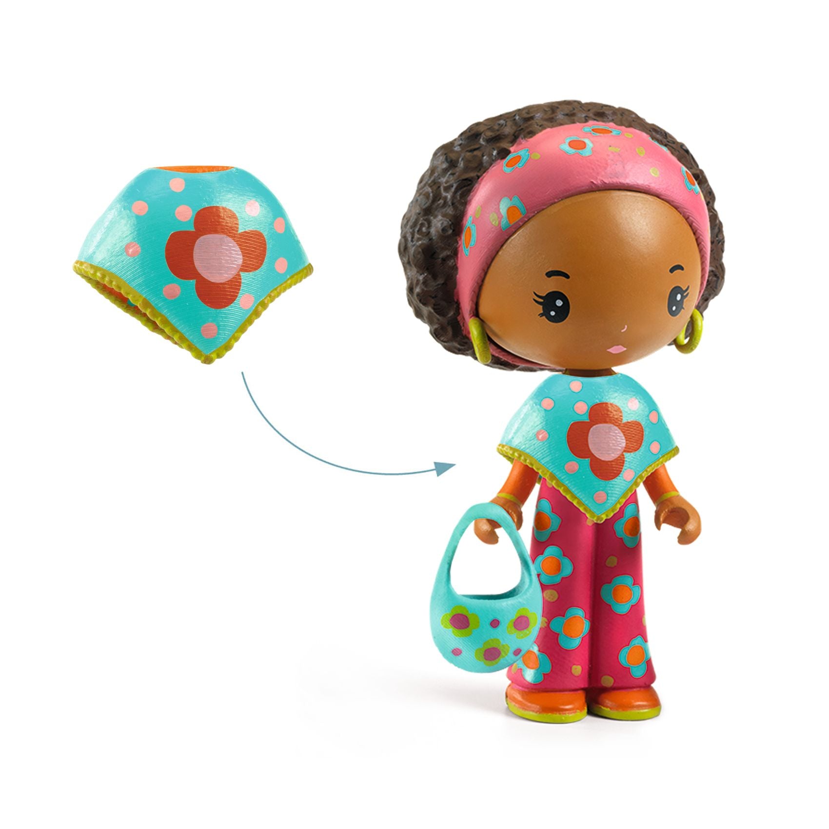 Toy figure with a detachable cape with matching hat and bag on a white background