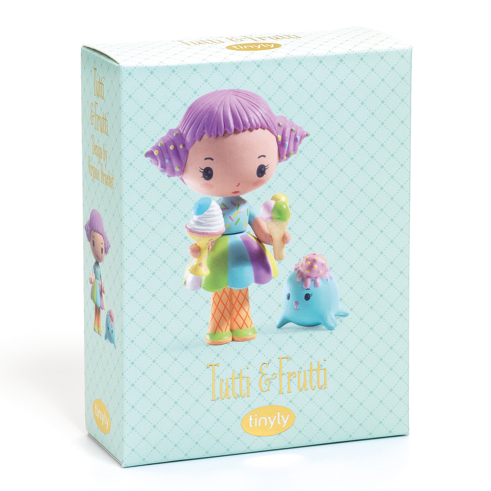 Toy figure with purple hair and rainbow outfit on a pale blue box with tinyly branding.