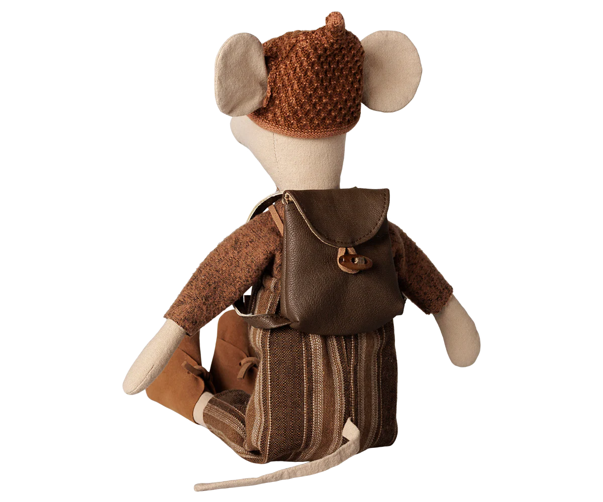 A small plush mouse figure shown from the back, wearing a brown knit hat, textured brown top, and striped brown bag, photographed on a plain white background.