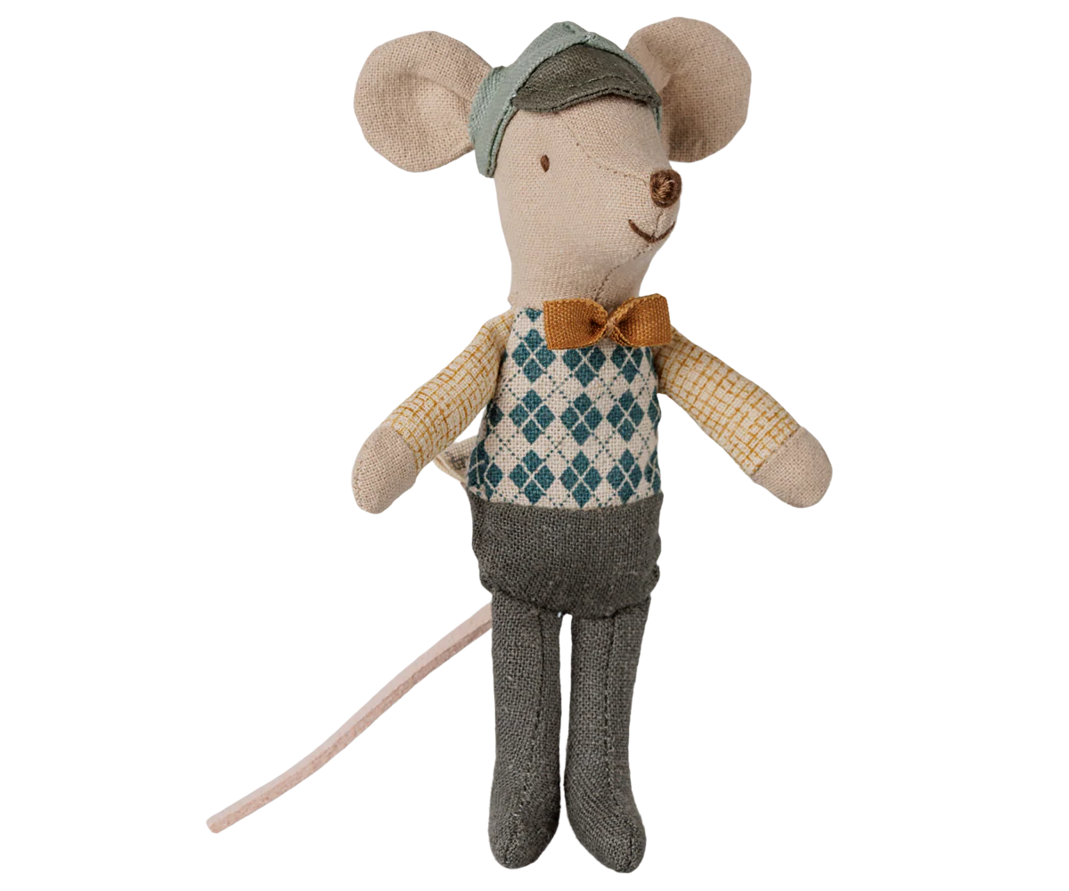 A plush toy mouse dressed in vintage clothing, featuring a beige body, gray trousers, a blue and beige argyle sweater vest, a brown bow tie, and a gray cap, set against a plain white background.