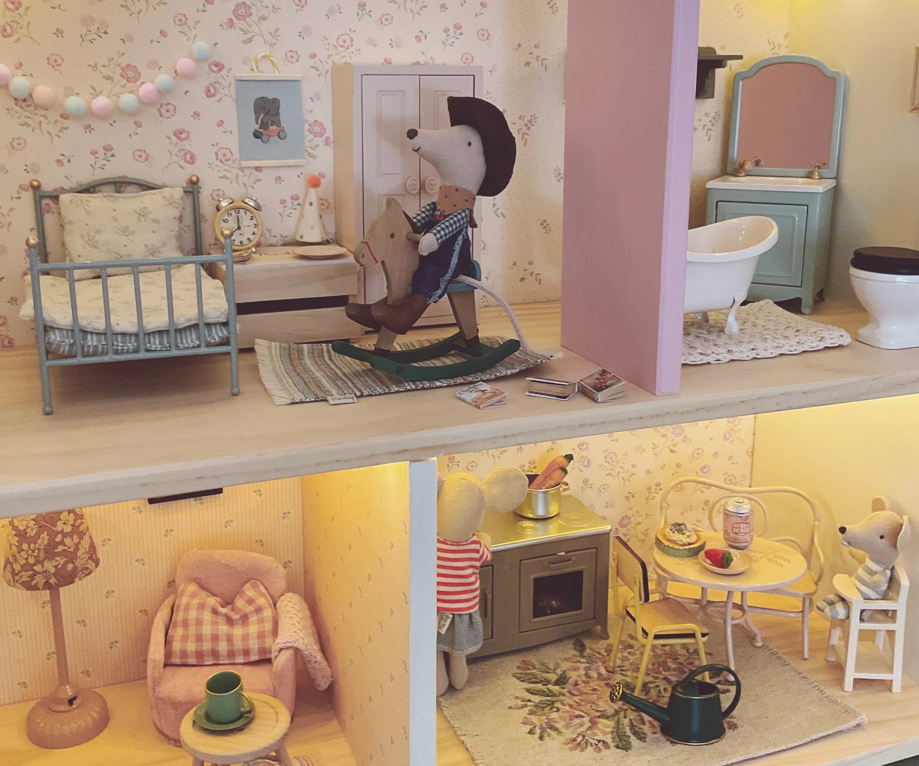Detailed dollhouse with miniature furniture and decor