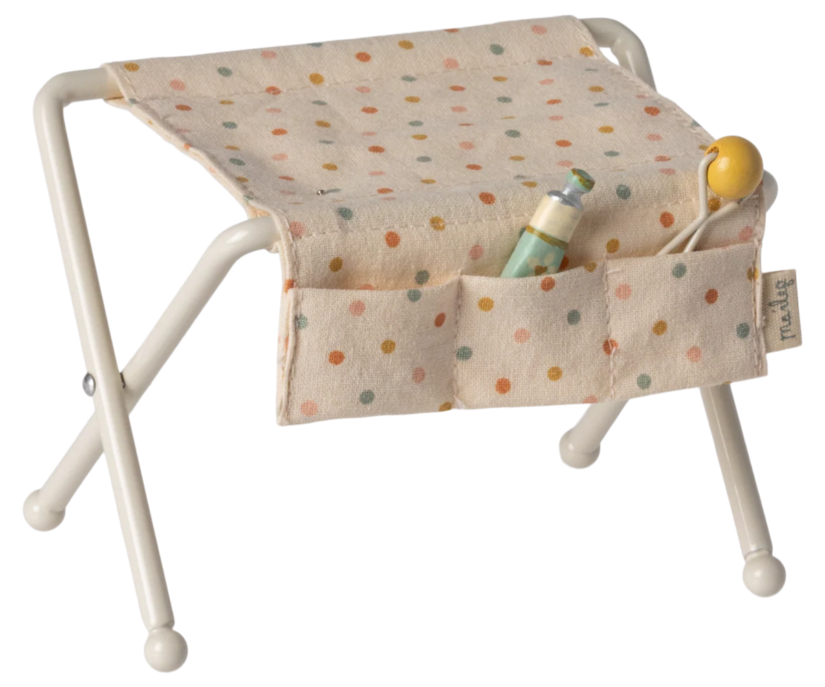 MAILEG miniature Baby changing table with polka dot cover and toys on a white background