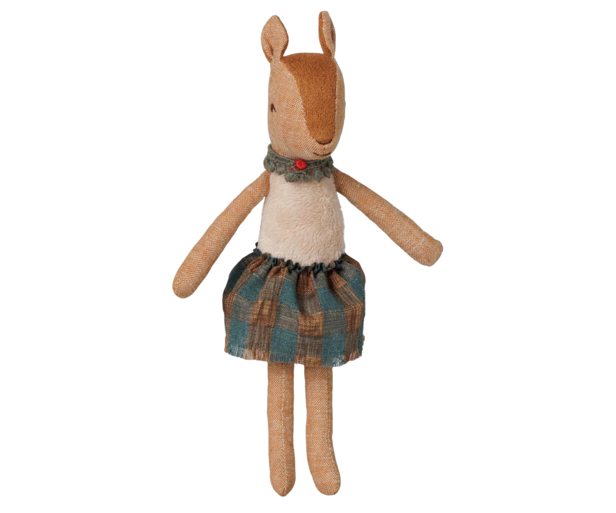 A handmade plush toy of a female deer or antelope doll with tan fabric limbs and head, a cream-colored bodice, and a plaid skirt in teal, brown, and beige tones, set against a plain white background.