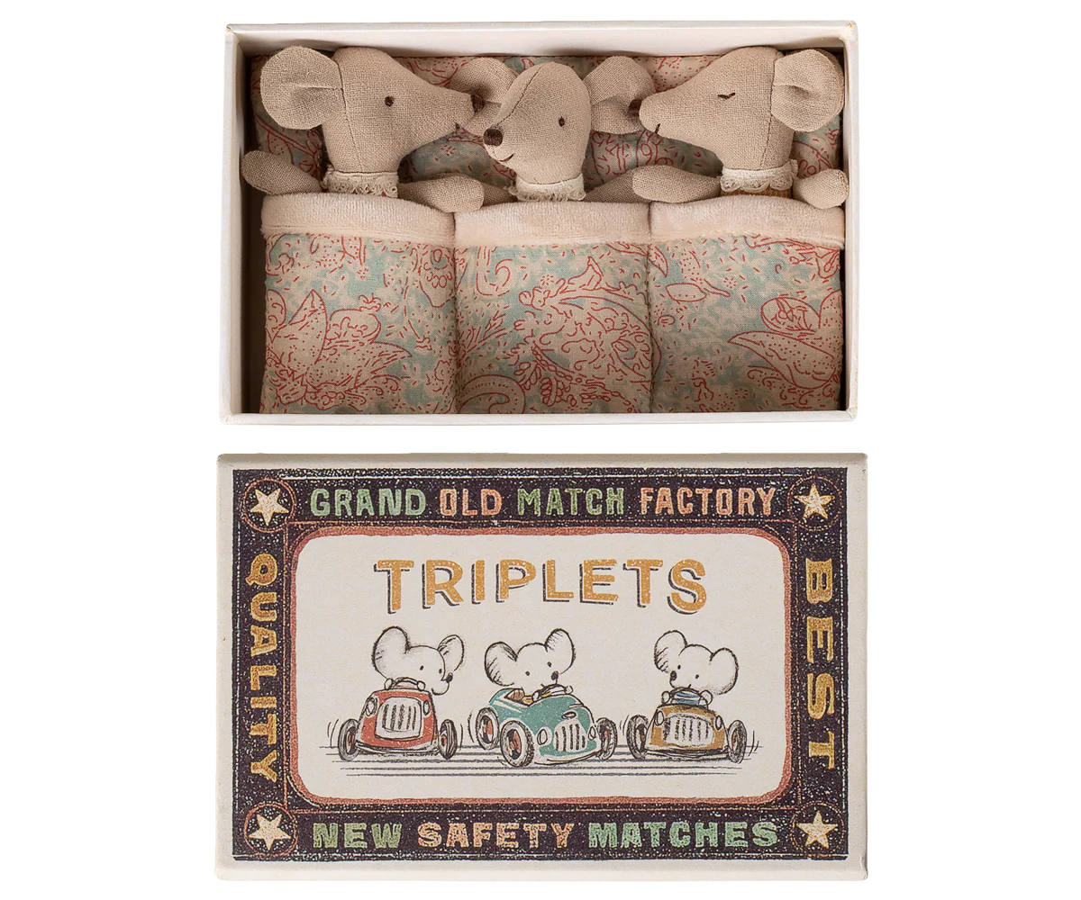 Matchbox with toy mice and vintage matchbox label on a white background