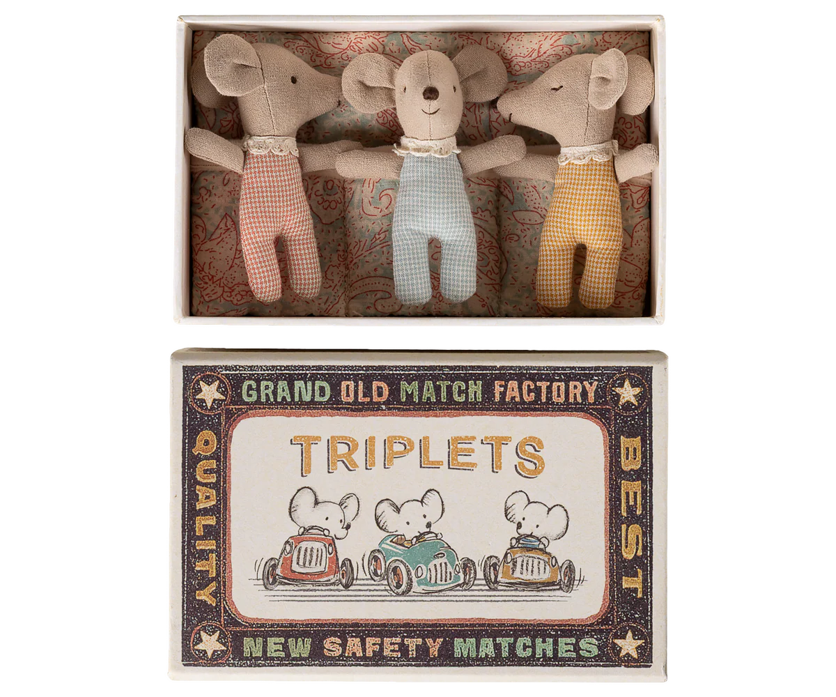Three toy mice in a matchbox with a vintage-style matchbox label.