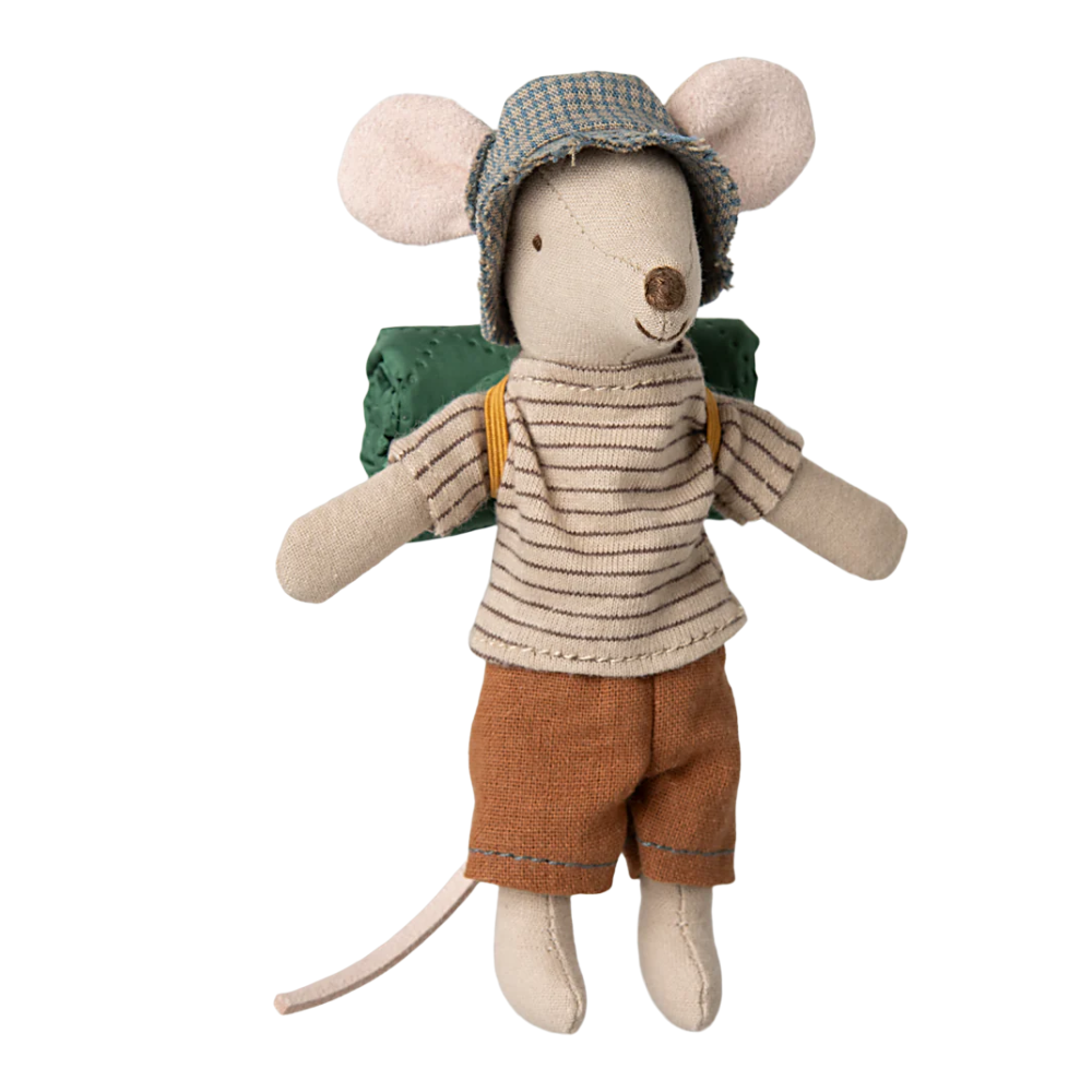 Stuffed toy mouse in a hat and outfit on a white background