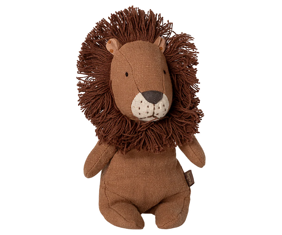 Brown lion plush toy on a white background