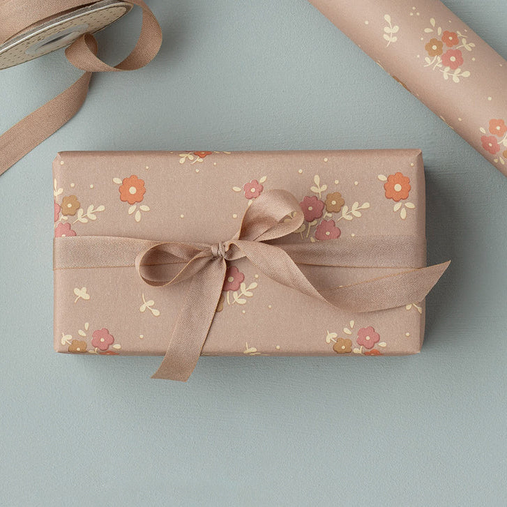 Maileg michette wrapping paper with floral design on a light blue background