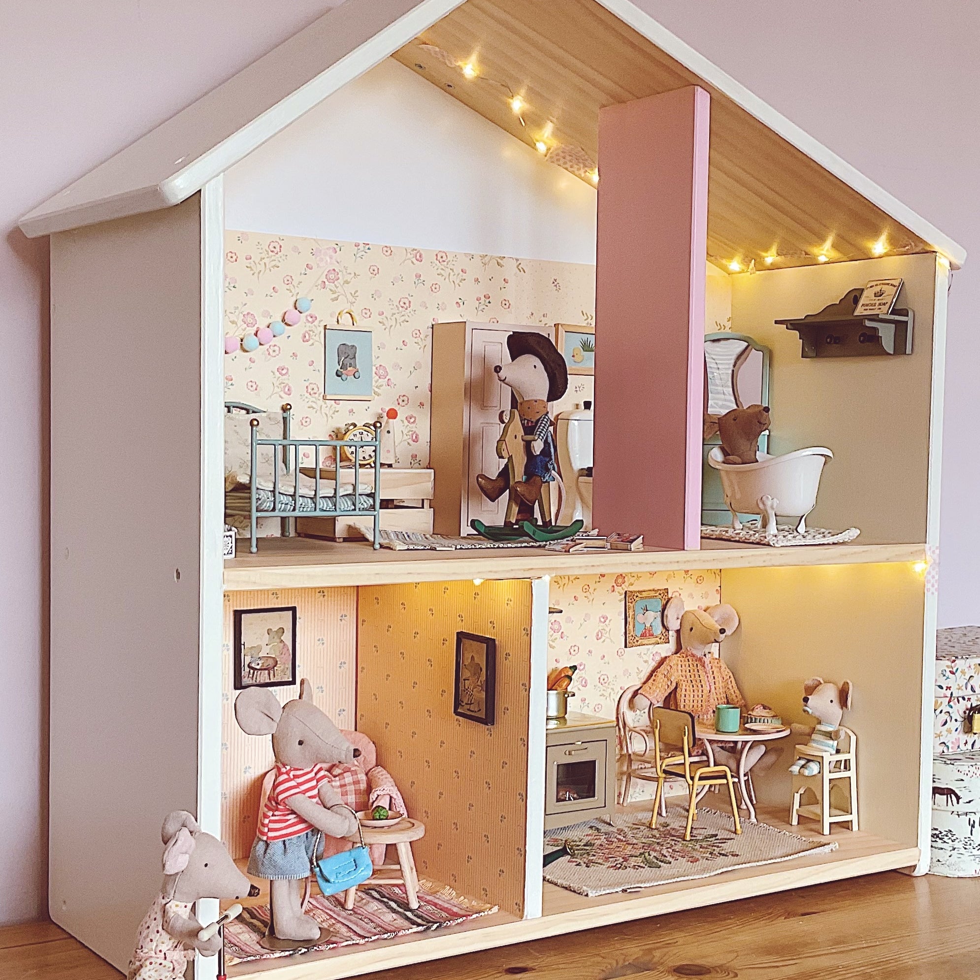 Maileg mouse Dollhouse with interior rooms and toys on a wooden floor