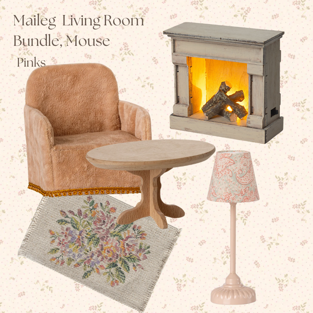 A children's dollhouse living room set featuring a pink plush armchair, a gray fireplace with glowing orange flames, a round wooden table, a pink paisley lamp, and a floral rug on a light pink floral background.