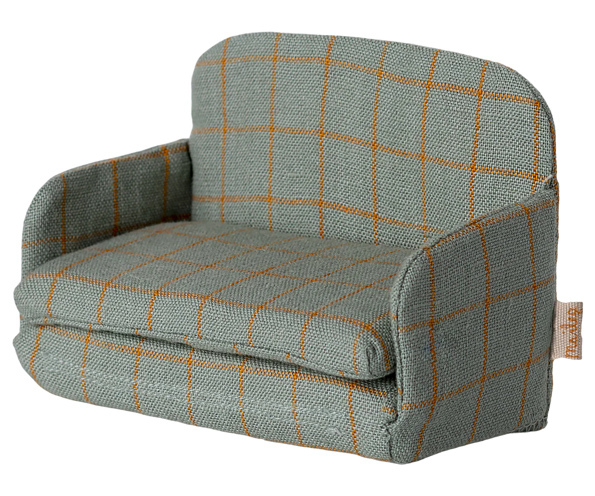 Maileg miniature dolls house sofa bed with checked  pattern on a white background