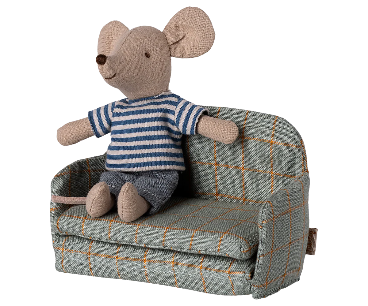 Maileg little brother Stuffed mouse toy in a striped sweater sitting on a checkered sofa with a white background