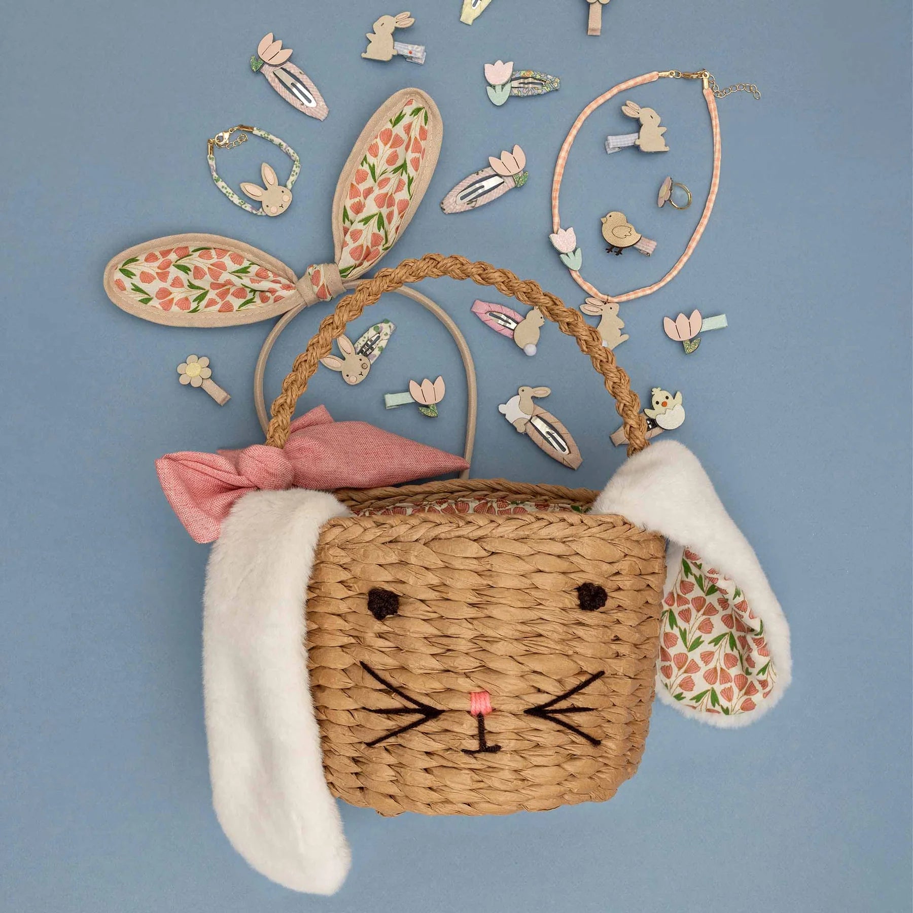 Woven basket with bunny ears and facial features on a blue background