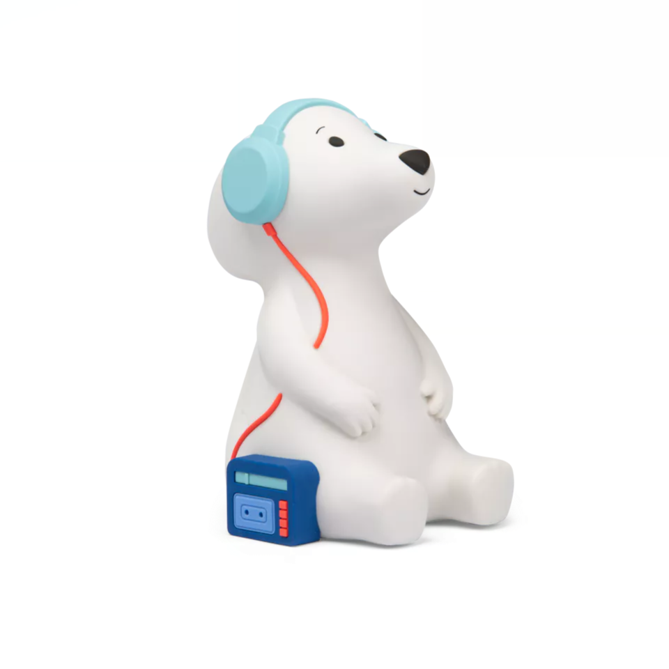 Moulin roty puce and pilou White dog nightlight with blue headphones and a blue cassette player on a white background