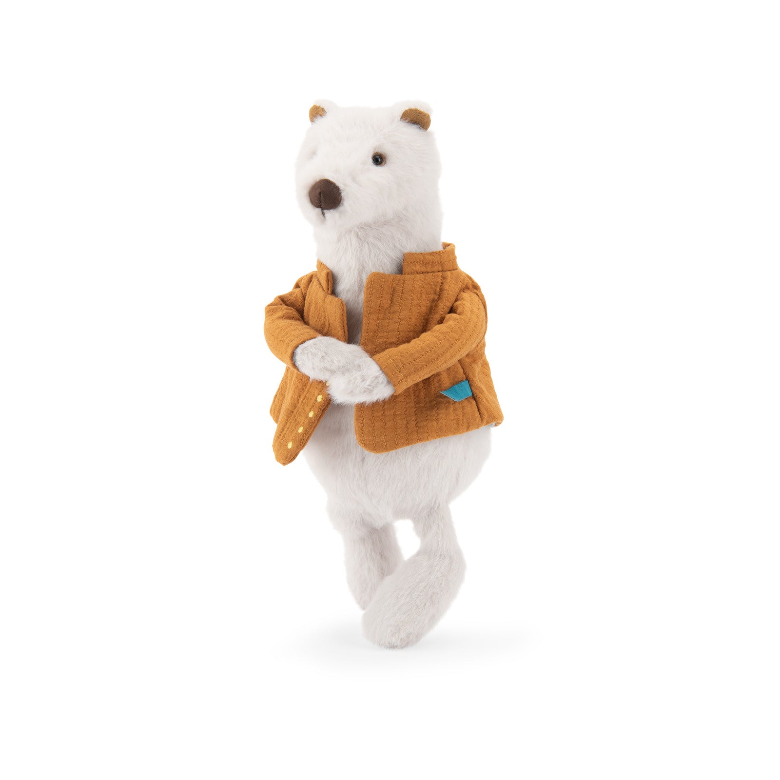 A plush polar bear toy standing upright, wearing a mustard yellow quilted jacket and holding a matching pouch, photographed on a clean white background.
