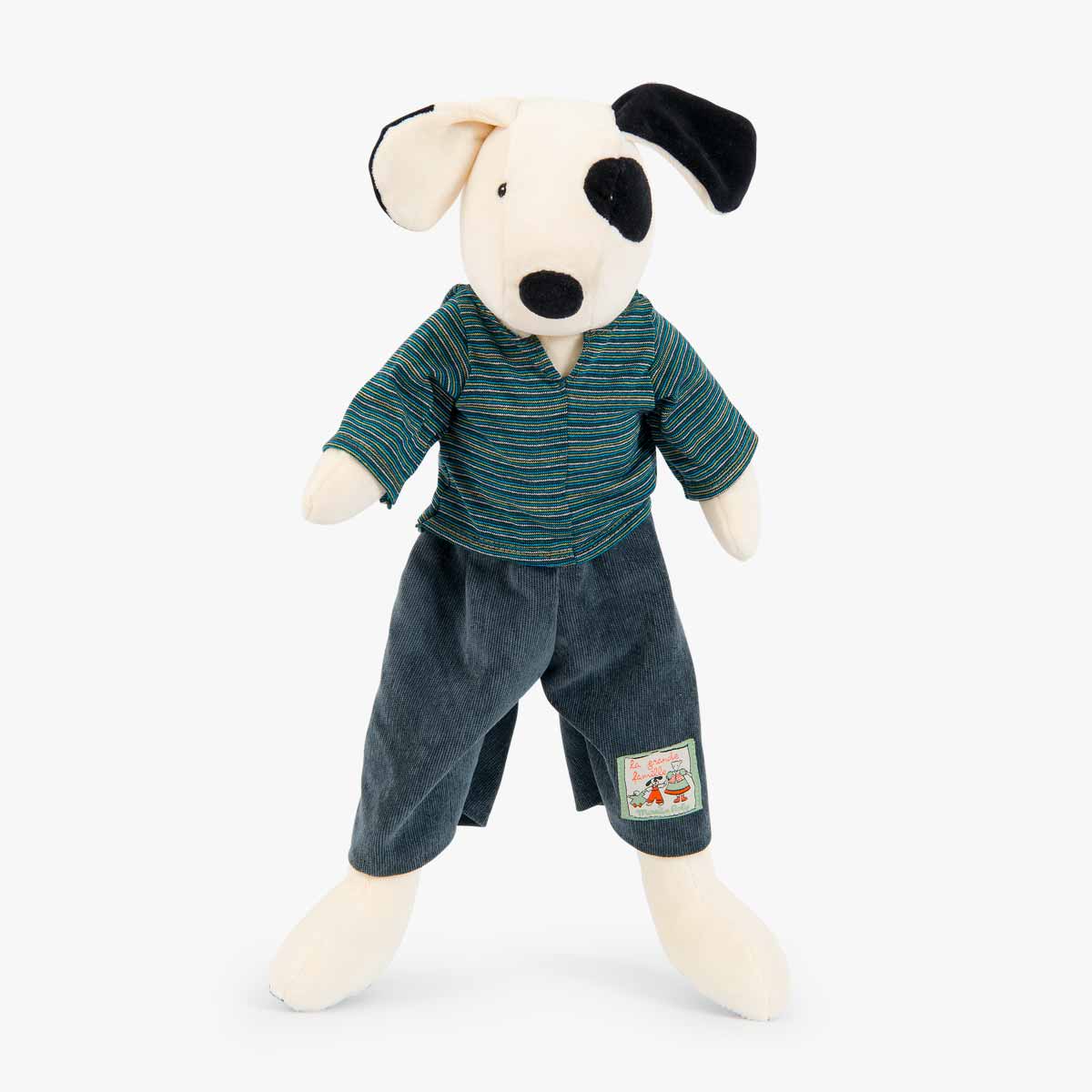 Stuffed dog toy wearing a green striped shirt and blue pants on a white background
