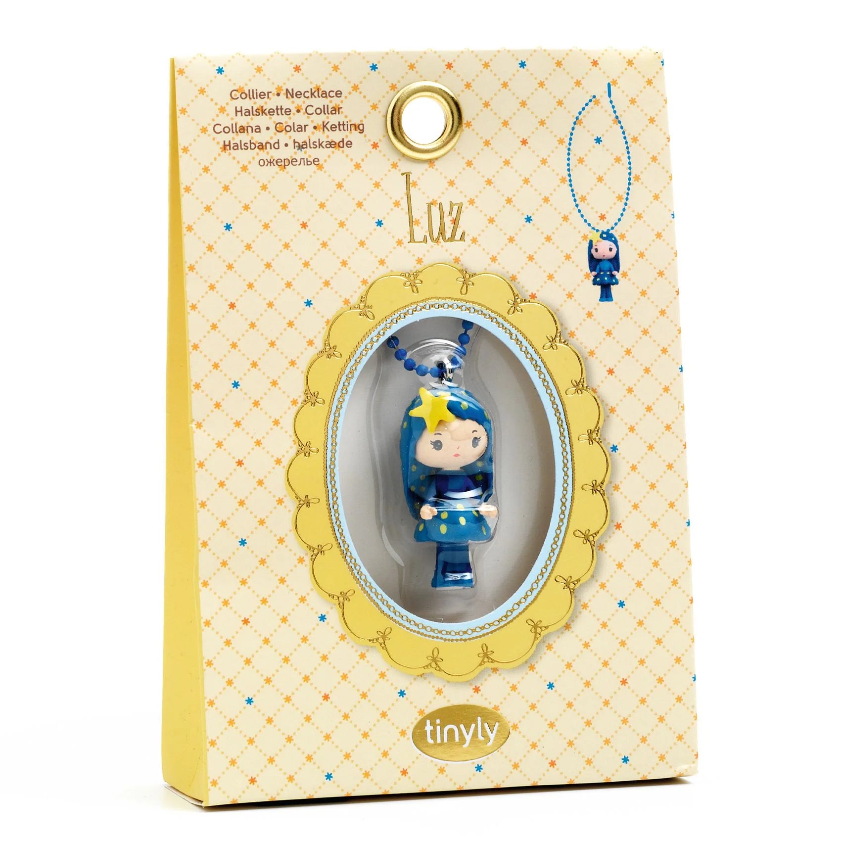 Blue figurine in a decorative yellow box with 'tinyly' branding