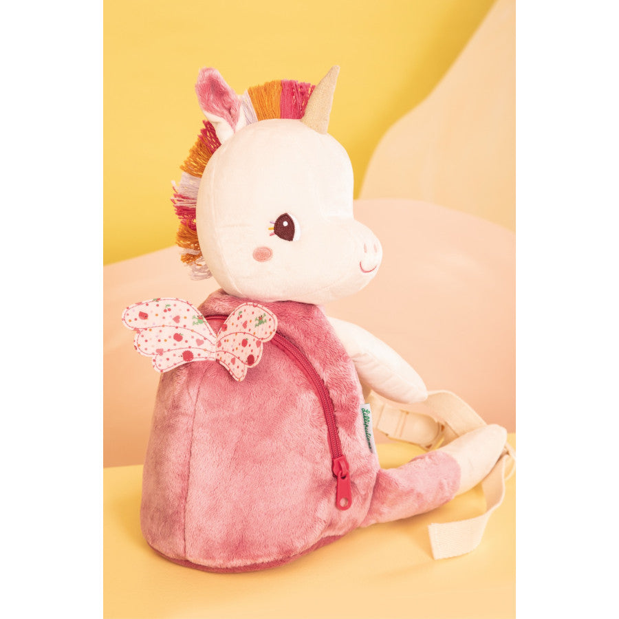 unicorn soft back with a colorful mohawk on a yellow background