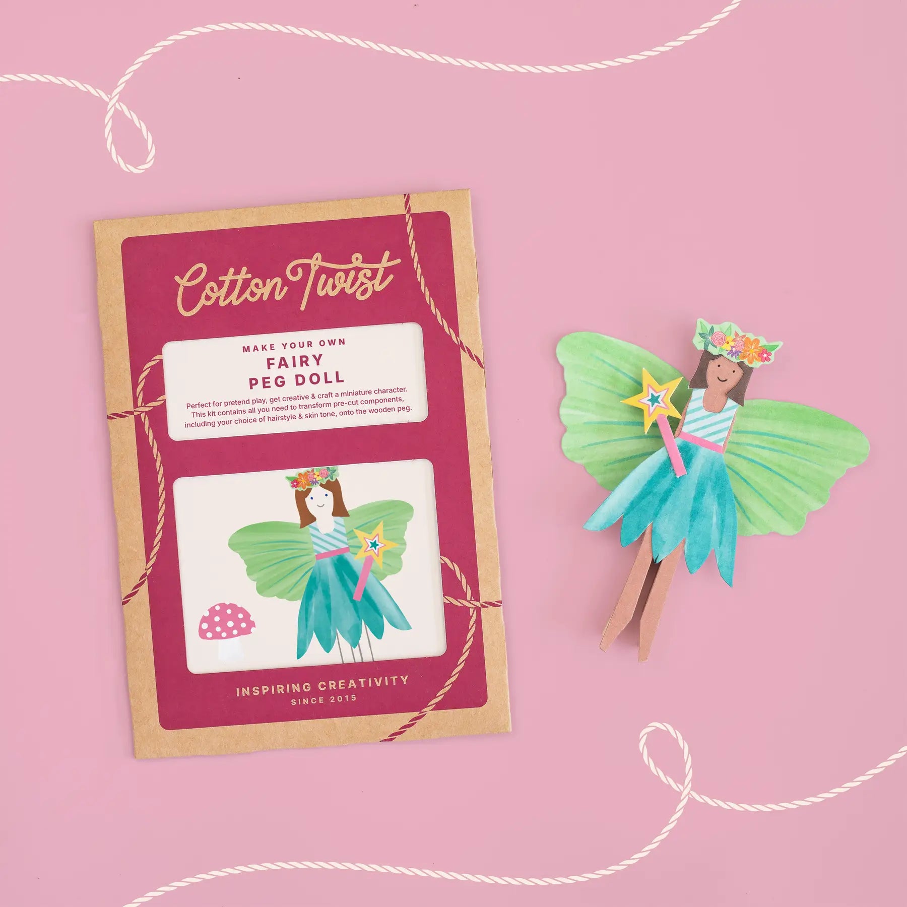 Fairy peg doll kit with packaging on a pink background