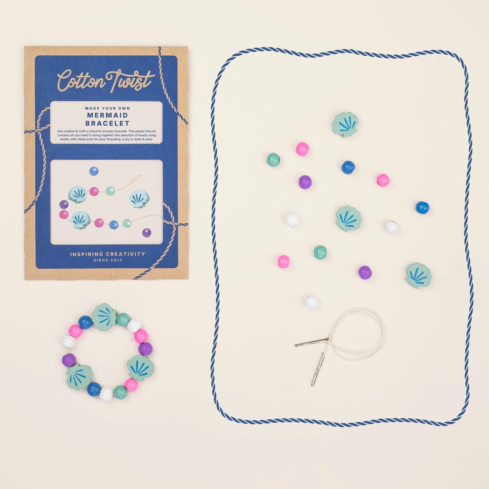 Mermaid bracelet kit with beads and packaging on a beige background