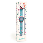 Children's watch with blue strap and pink accents in a decorative box, brand 'ticlock' visible.