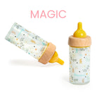 Two baby bottles with wooden caps on a white background, one labeled 'MAGIC'.