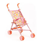Pink toy stroller with floral pattern on a white background