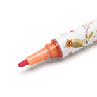 Decorative felt tip pen with a floral and bird design on a white background