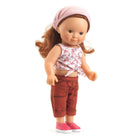 Doll wearing a floral top and brown pants with a pink headband on a white background