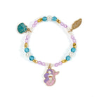 Colorful beaded bracelet with mermaid and shell charms on a white background