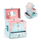 Decorative music box with ballerina design on a white background