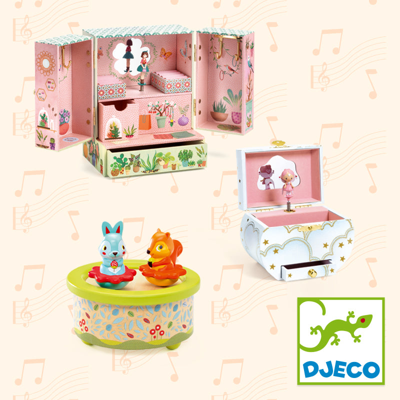 Children's toy set with music box, dollhouse, and figurines on a light background with musical notes.