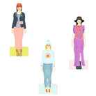 Three paper dolls with different outfits on a white background