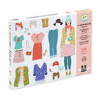 Box for a paper doll set with various clothing items and accessories on a white background