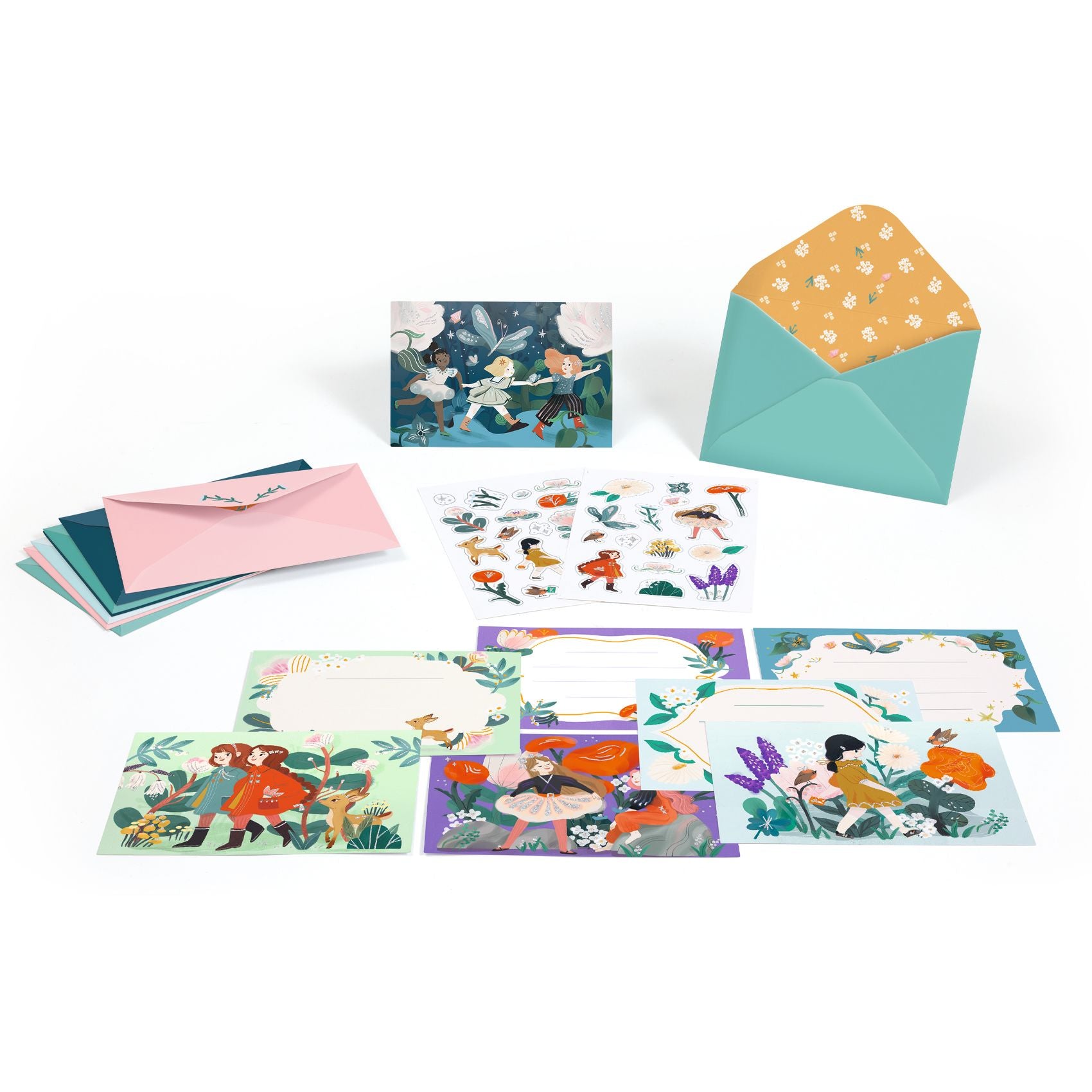 Set of colorful greeting cards and envelopes on a white background