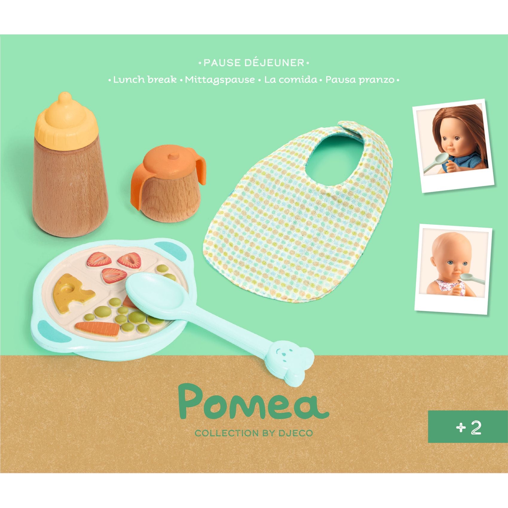 Pompea toy set with bib, bowl, spoon, and bottle on a green background